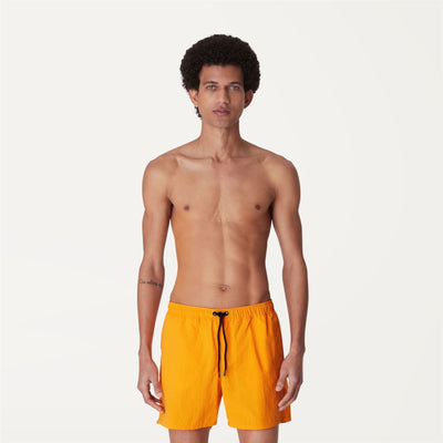 Bathing Suits Man LE VRAI Olivier Swimming Trunk Orange Saffron | K-Way Dressed Back (jpg Rgb)